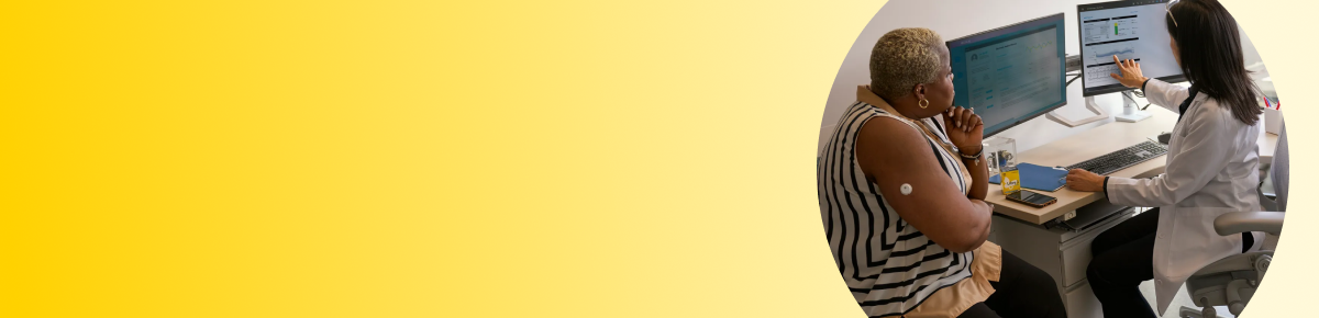 Woman speaking to a doctor wearing a FreeStyle Libre 3 Plus sensor