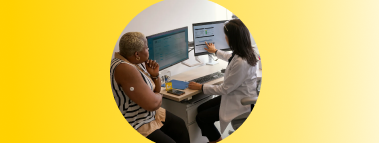 Woman speaking to a doctor wearing a FreeStyle Libre 3 Plus sensor