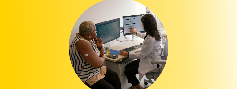 Woman speaking to a doctor wearing a FreeStyle Libre 3 Plus sensor